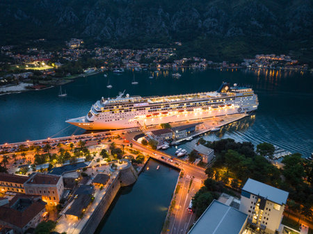 Big Cruise Ship in Kotor on the coast of Boka bay in Mediterranean, Montenegro. Destination in Europe. Aerialの写真素材