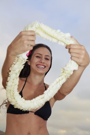 beautiful young woman on lanikai beach at sunriseの写真素材