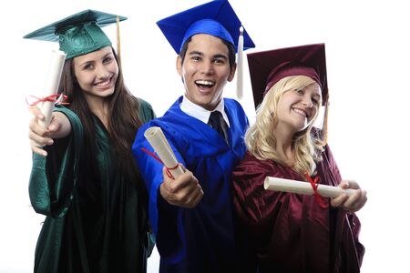 asian man and two women graduates in cap and gown