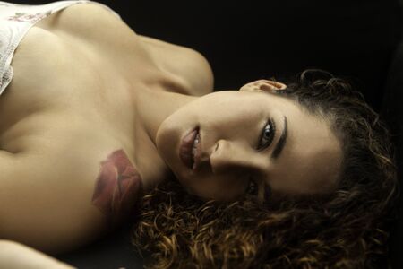 portrait of beautiful woman lying downの写真素材