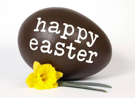 Chocolate easter egg with text  Happy Easterの写真素材