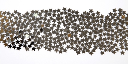 Silver stars on the white backgroungの写真素材