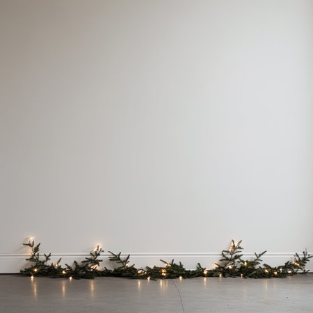 Christmas garlands on the background of a white wall.の写真素材
