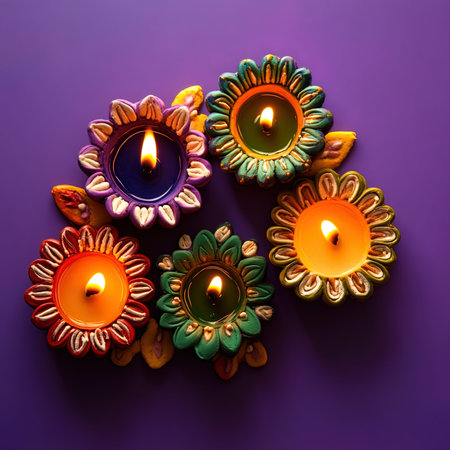 Happy Diwali - Clay Diya lamps lit during Dipavali, Hindu festival of lights celebration.の写真素材