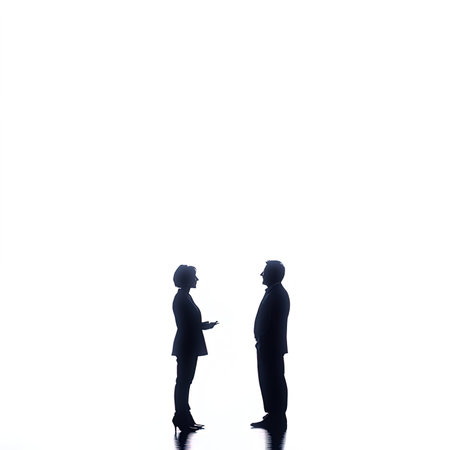 Silhouette of two business people talking, isolated on white background