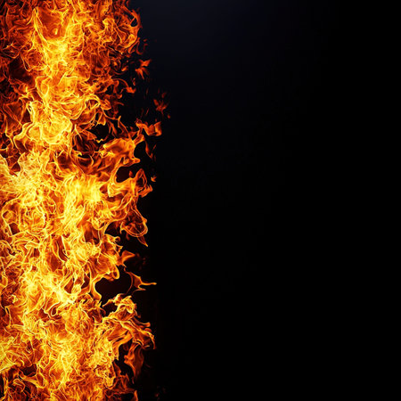 Fire flames isolated on black background with copy space for your text.の写真素材