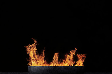 Close-up of a fire on a black background with copy spaceの写真素材