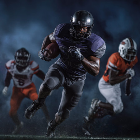 american football player in action on a dark smoky background.の写真素材