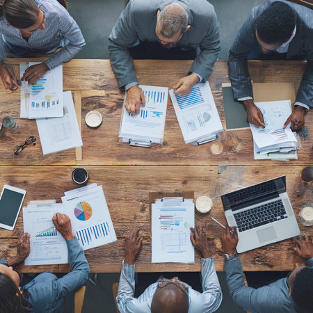 Business People Meeting Working Office Concept. Top view of business people working together in...