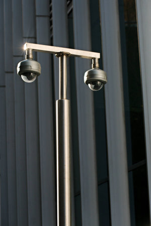 Security CCTV cameras outside an office buildingの写真素材