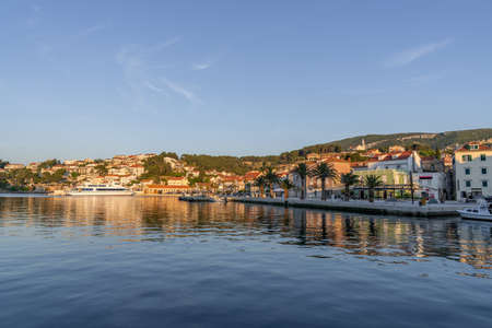 Beautiful town on the seafront with many white houses with red roofs