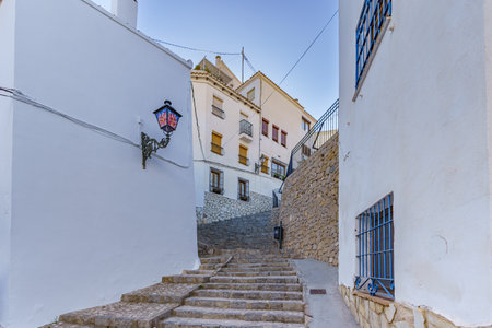 An old atmospheric city with narrow and cramped quiet streets and stairsの写真素材