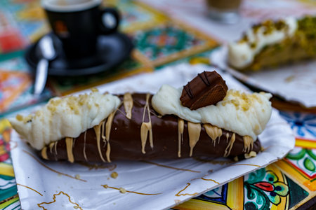 A delicious Sicilian cannoli dessert accompanied by the perfect Italian espresso.