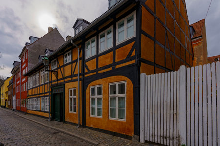 Terraced old atmospheric tenement houses, painted in different colorsの写真素材