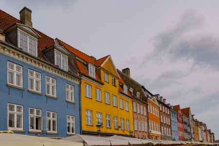Terraced old atmospheric tenement houses, painted in different colorsの写真素材