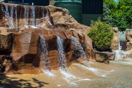 Waterfall with brown rocksの写真素材