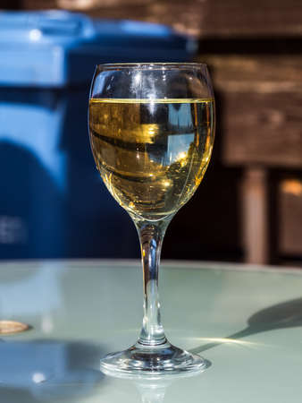 A glass of wine on a non-white-brown backgroundの写真素材