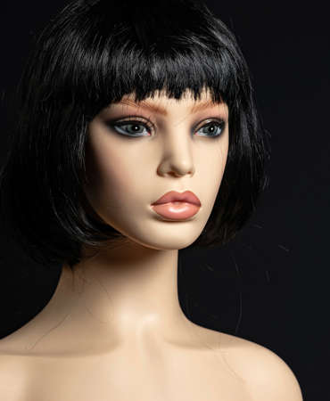 Mannequin head on a black backgroundの写真素材