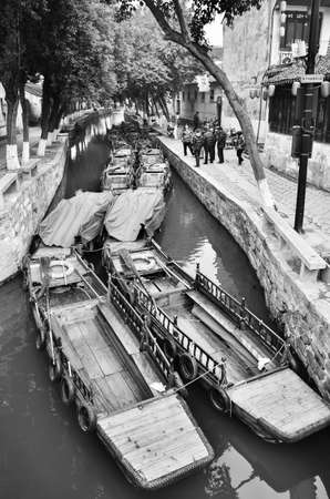 moored row boats awaiting in canal for a tourist tripのeditorial素材