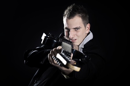Portrait of young guitaristの写真素材