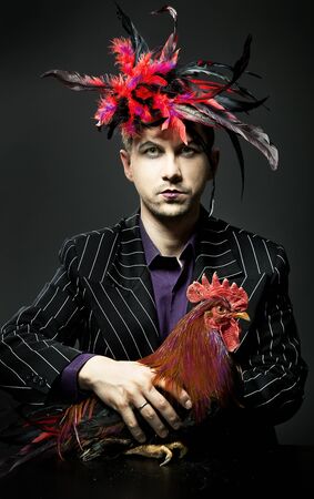 Man with rooster