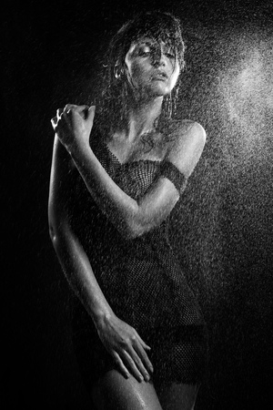 Portrait of  wet woman in  black and whiteの写真素材