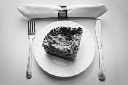 Hot lasagna on a plate.の写真素材