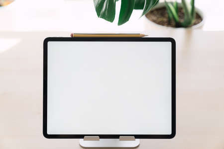 Tablet PC with white screen floatingの写真素材