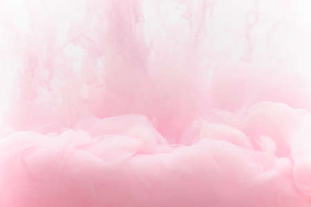 pink smoke on a white backgroundの写真素材