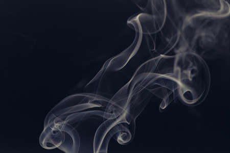 white smoke on a black backgroundの写真素材