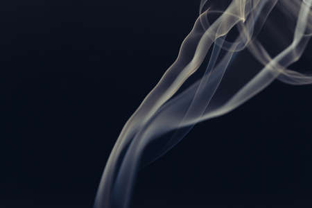 white smoke on a black backgroundの写真素材