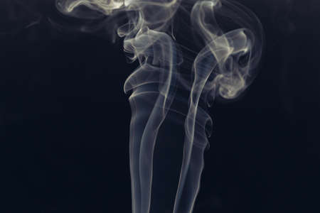 white smoke on a black backgroundの写真素材