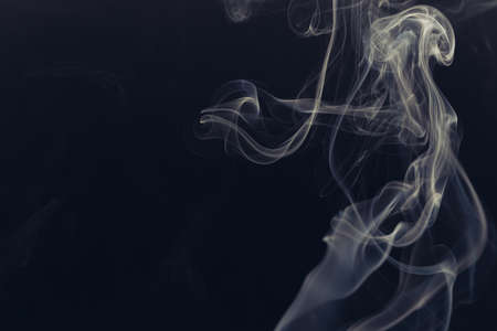 white smoke on a black backgroundの写真素材