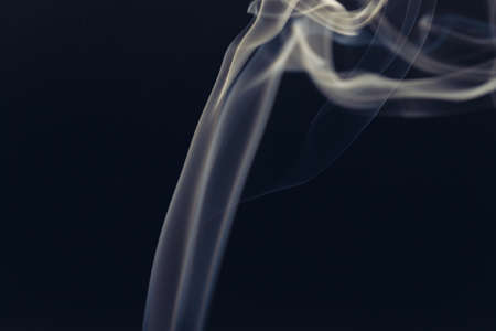 white smoke on a black backgroundの写真素材