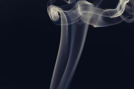 white smoke on a black backgroundの写真素材