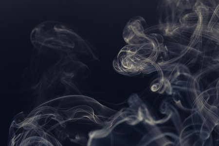 white smoke on a black backgroundの写真素材