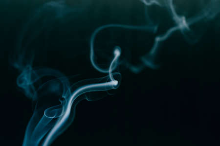 white smoke on a black backgroundの写真素材