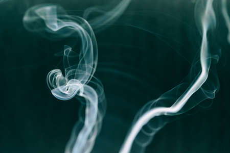 white smoke on a black background