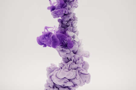 mauve smoke on a white backgroundの写真素材