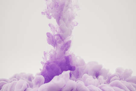 mauve smoke on a white backgroundの写真素材