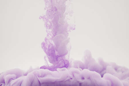 mauve smoke on a white backgroundの写真素材