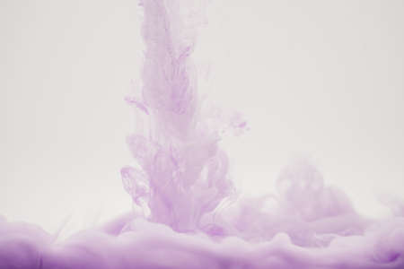 mauve smoke on a white backgroundの写真素材