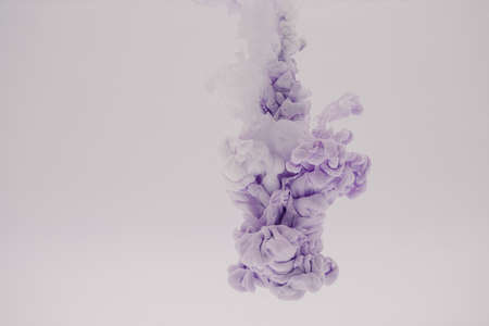mauve smoke on a white backgroundの写真素材
