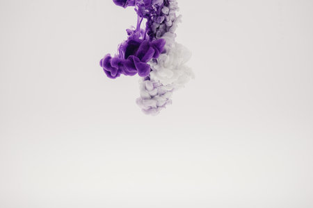 mauve smoke on a white backgroundの写真素材