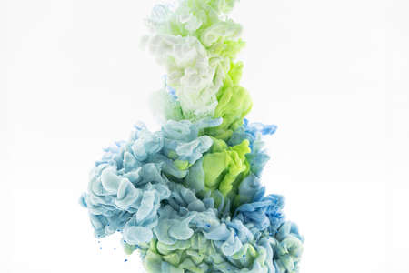 blue green white smoke on white backgroundの写真素材