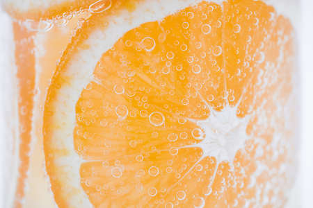 Orange slices and air bubblesの写真素材