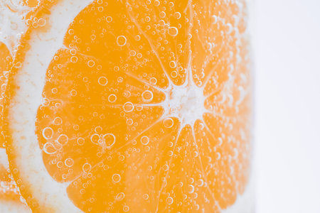 Orange slices and air bubblesの写真素材