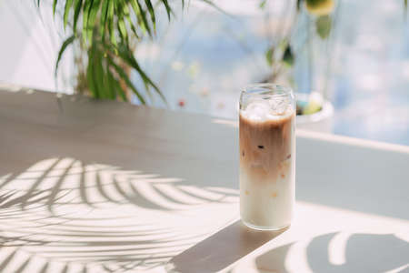 Ice cafe latte with ice and milkの写真素材