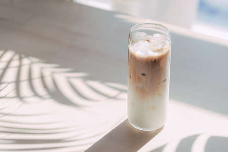 Ice cafe latte with ice and milkの写真素材