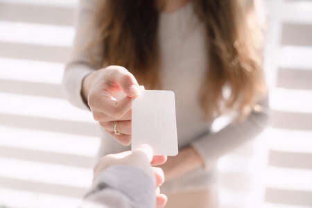 Exchanging business cards for businessの写真素材